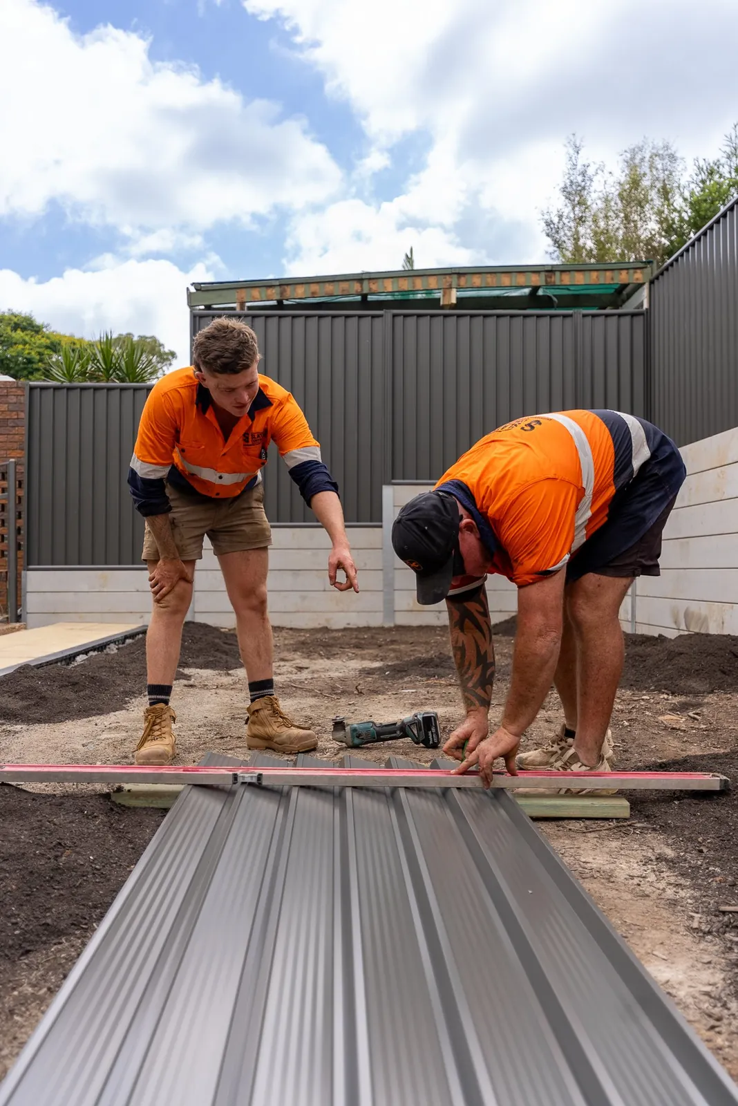 Preparing Colorbond fence panels on site