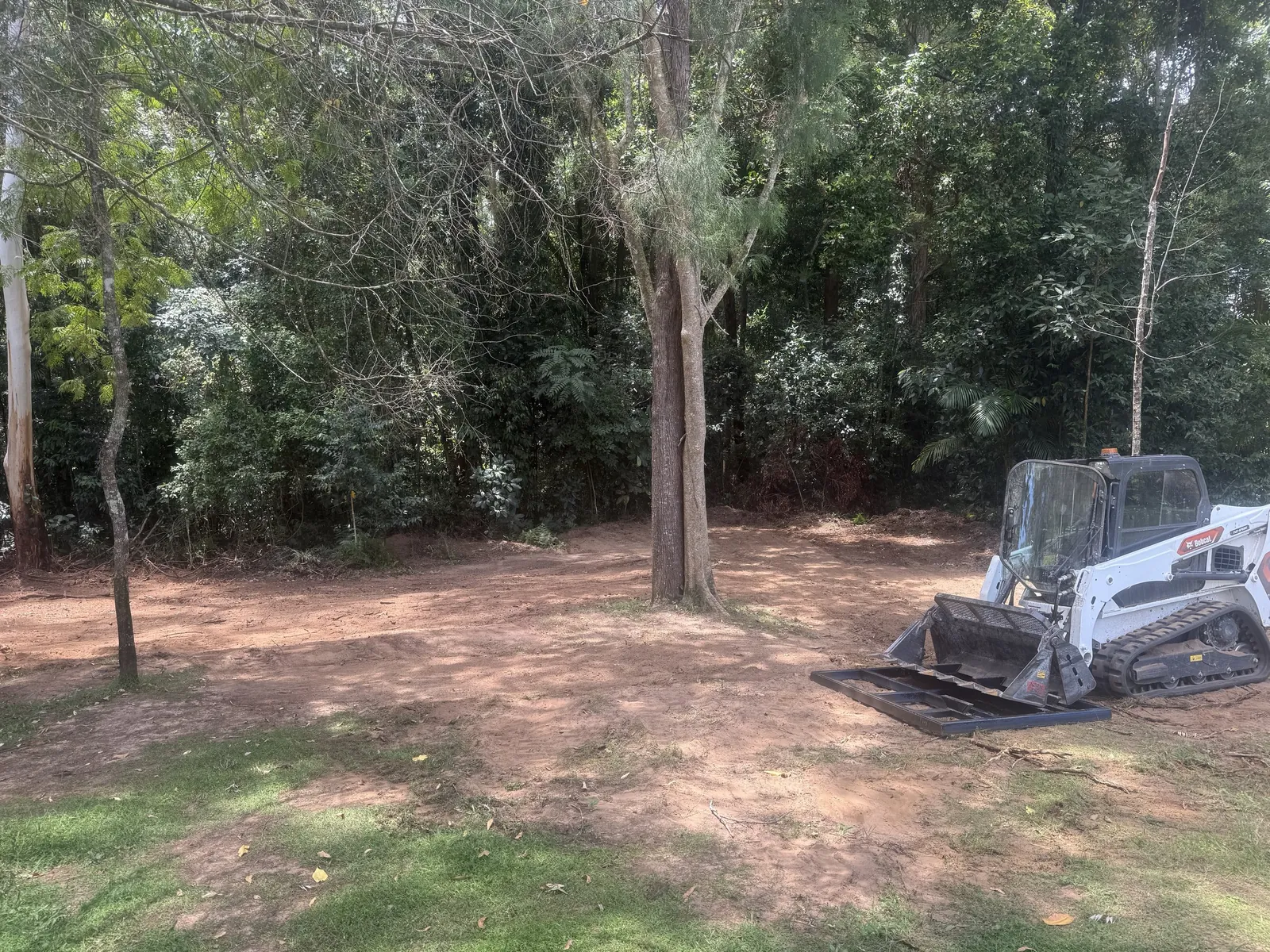 Posi track clearing and levelling a block